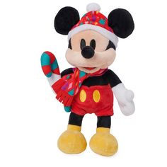 a mickey mouse stuffed animal wearing a hat and scarf