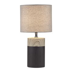 a table lamp with a wooden base and fabric shade on the top, against a white background