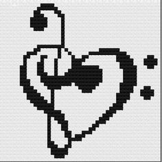 a cross stitch pattern with the shape of a heart