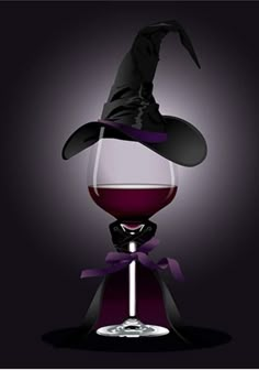 a glass of wine with a witches hat on top