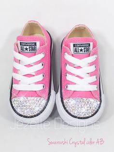 Custom Bling Kid's Converse Hand Jeweled w/ Swarovski Crystals ✨ by Jezelle Designs! DETAILS/OPTIONS: ★These adorable PINK Converse are customized to your little one's size and in his/her favorite color. ★We use only 100% Authentic Swarovski Crystals that have been hand placed and glued with precision and care.. They SPARKLE and SHINE LIKE DIAMONDS! ★Choose CRYSTAL COLOR at checkout: *clear/diamond shown on the white pait avove; *AB - Aurora Boreale shown on the pink pair above <> ★ This l Kids Pibk Converse, Converse Shoes Pink, Baby Converse Shoes, Bedazzled Converse, Bling Baby Shoes, Personalized Converse, Girls Wedding Shoes, Baby Chucks, Birthday Shoes