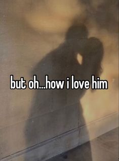 the shadow of a person standing in front of a wall that says, but oh how i love him