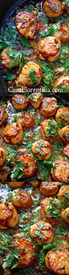 some food is cooking in a pan on the stove and it looks like scallops