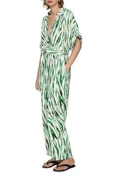 Vivid animal stripes embolden this lightweight jumpsuit that brings a chic element to any occasion. Spread collar Elbow-length sleeves Ties at waist Side-seam pockets 100% viscose Machine wash, line dry Imported Coverall Jumpsuit, Bow Women, Print Jumpsuit, Jeans Mom, Striped Jumpsuit, Printed Jumpsuit, Elbow Length Sleeve, Tulum, Maternity Clothes