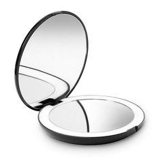 an open compact mirror on a white background