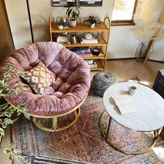 a living room filled with furniture and decor