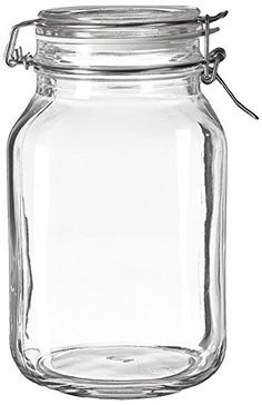 a large glass jar with a metal clip on the lid and nozzles in it