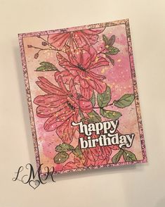 a card with pink flowers on it and the words happy birthday written in cursive writing