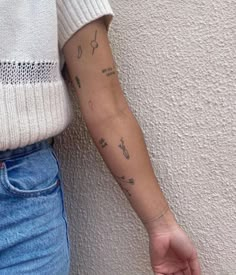 a person with a tattoo on their arm