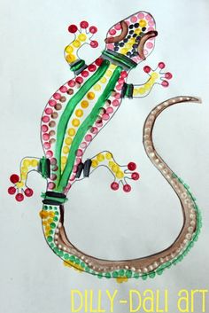 a drawing of a lizard with dots on it's body and tail is shown