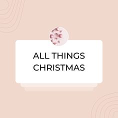 the words all things christmas on a pink and white background with an image of a button