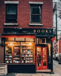 the front of a bookstore with an instagram post about it's book sale