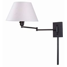 a wall light with a white shade on the arm and a black metal pole attached to it