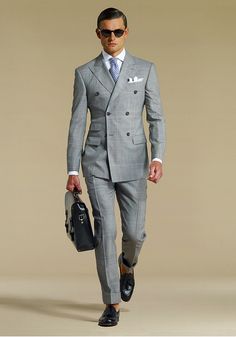 Double-breasted grey checked suit, white shirt, light blue tie. Accessories black shades, briefcase. Checked Suit, Hackett London, Fashion Suits For Men, Fashion Blogger Style, Men’s Suits, Gray Suit