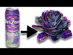 a purple flower next to a can of arizona grapeade soda with an arrow pointing up at it