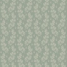 a green wallpaper with white leaves on it's sides and a light blue background