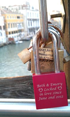 a padlock on the side of a bridge that says, both & memory locked in love since june 2012