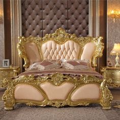 a fancy bed with gold trimmings in a luxurious bedroom setting on carpeted flooring