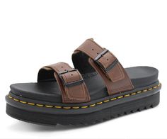 PRICES MAY VARY. EVA sole Two adjustable buckle straps Tough and durable, thanks to a Goodyear welt For half sizes, it's recommended to go down a size Platform height: 1 1/2 in; Heel height: 1 7/8 in Doc Marten Sandals, Doc Marten, Mens Shoes Sandals, Sandal Platform, 12th Man, Eva Sole, Goodyear Welt, Doc Martens, Slide Sandals