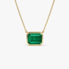 Discover the allure of our Natural Emerald Necklace, showcasing an octagon-cut emerald set in 14k solid gold. Handcrafted with care in a bezel setting, this pendant exudes elegance and charm. Perfect for women seeking timeless beauty, elevate your ensemble with this exquisite piece in stunning green hues. ▶ 1.50 ctw * Made to Order * Gold Kt: 14K (also available in 18K) * Available Gold Color: Rose Gold, Yellow Gold, White Gold * Length and Width: 9.50 X 7.50 MM * Octagon Emerald: 1 pc 9x7 MM * Emerald Cut Diamond Emerald Necklace, Emerald Cut Emerald Necklace With Diamond Cut, Faceted Emerald Cut Emerald Jewelry, Bezel Set Octagon May Birthstone Jewelry, 14k Gold Emerald Cut Emerald Necklace, Emerald Jewelry With Bezel Setting In Asscher Cut, Emerald Asscher Cut Jewelry With Bezel Setting, Gia Certified Octagon May Birthstone Jewelry, Gia Certified Emerald Cut Necklaces