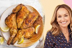 a woman standing next to a plate of chicken