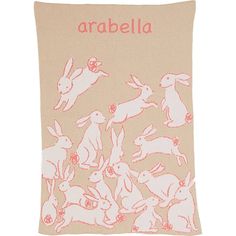 a towel with rabbits on it and the word'arablla'written in pink