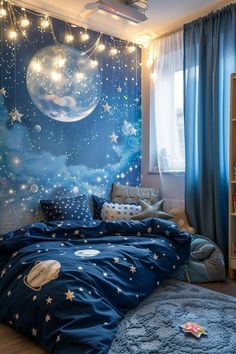 a bedroom decorated in blue with stars and planets on the wall