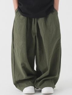 These premium kids' balloon pants are crafted from a bio-washed blend of 55% linen and 45% cotton, offering both durability and breathability perfect for growing children. The comfortable elastic waistband and thoughtfully designed vertical darts create a flattering tapered silhouette while maintaining a relaxed fit throughout. Available in black, beige, and khaki across sizes J1-J4 (fitting heights 110-150cm), these Korean-made pants feature high-quality construction verified by KATRI testing a Monk Pants, Balloon Pants, Buddhist Monk, Kids Pants, Bottom Clothes, Fall 2024, Bottoms Pants, Business Casual, Balloons