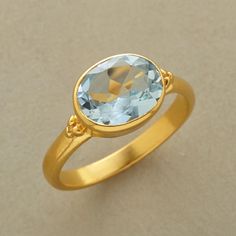 COOL BLUE RING�--�Crystalline blue topaz is a cool counterpart to a warm 22kt goldplated band. Three golden granulation beads dot either side. Tanzanite Engagement Ring, Lapis Ring, Artisan Rings, Blue Ring, Sundance Catalog, Aquamarine Engagement Ring, Handmade Rings, Large Hoop Earrings, Rings Cool