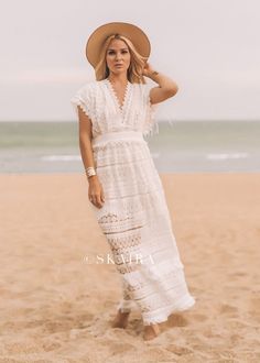 Deep V-Neck Maxi Lace Dress with Accentuated WaistColor: WhiteMaterial: 100% PolyLength: 50" armpit downWaist: Small 28", Medium 30", Large 32"Model wearing S and is 5'7" tallALL SALES ARE FINAL. Bohemian V-neck Dress With Crochet Trim, Beach V-neck Lace Dress, Bohemian V-neck Crochet Lace Dress, Summer V-neck Dress With Crochet Lace, White V-neck Crochet Dress For Beach, White V-neck Maxi Dress With Lace Trim, White Crochet Maxi Dress For The Beach, White Crochet Maxi Dress For Beach, Elegant White V-neck Boho Dress