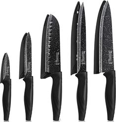 five knives are lined up in a row with black handles and blades on each side