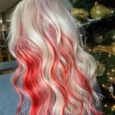 Red And White Peekaboo Hair, Peppermint Hair Color, Blonde With Bright Red Highlights, Red Dye On Blonde Hair, Candy Cane Hair Color, White Hair Red Highlights, White And Red Hair Color, Blond And Colored Hair, Christmas Hair Dye Ideas