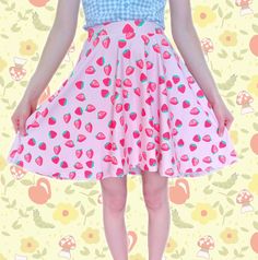 "A kawaii pink strawberry skirt featuring a summer strawberry print. The skater skirt fabric has a slinky, slightly shiny knit feel. The soft fabric and elastic waistband will have you ready for your next outing or anytime you want to be cute and sweet. Apparel and bedding ship separate from handmade items. Delivered in 2-4 weeks. ✰ ★ ✰ ★ ✰ ★ ✖️ 82% polyester, 18% spandex (mid-weight jersey) ✖️ Machine-washable cold cycle. Tumble dry low, do not bleach ✖️ Avoid rough surfaces ✖️ 3/4th circle ski Spring Kawaii Fitted Mini Skirt, Kawaii Fitted Mini Skirt For Summer, Fitted Kawaii Mini Skirt For Summer, Fitted Kawaii Mini Skirt, Summer Kawaii Fitted Skirt, Kawaii Fitted Summer Skirt, Cute Flared Summer Skirt, Cute Flared Skirt For Summer, Kawaii Fitted Bottoms For Spring