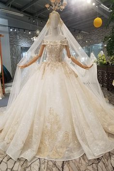 a wedding dress on display in a store