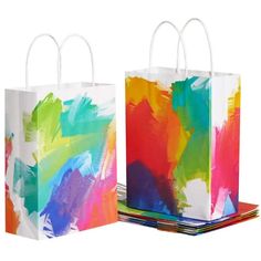 two colorful bags with handles on each side