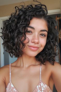 26 Curly Haircuts to Suit Your Face Shape in 2024 Medium To Short Curly Haircuts, Fade Haircut Women Curly Hair, Short Haircuts For 3b Curly Hair, Curly Haircut For Oval Face Women, Styles For Curly Short Hair, Short Curly Haircuts Side Part, Short Curly Hair Without Bangs, Short Brunette Curly Hair, Short Length Curly Haircut