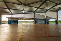 an empty basketball court with no people in it