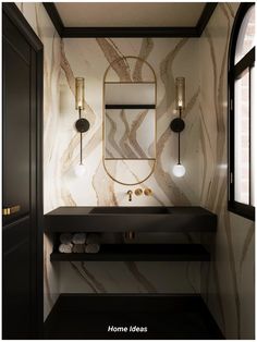 the bathroom is decorated in black and white marble, with gold accents on the wall