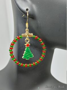 These cute earrings are made using beading hoops, beaded with red and green glass seed beads and accented with Christmas tree charms Grinch Earrings, Tree Charms, Christmas Tree Charm, With Christmas Tree, Earring Ideas, Glass Seed Beads, Christmas Earrings, Christmas Jewelry, Jewelry Earrings Hoops