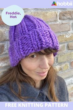 a woman wearing a purple knitted hat with the words free knitting pattern on it