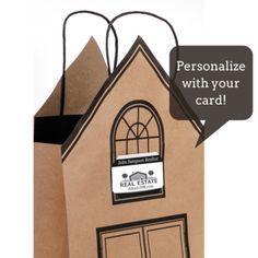 a brown paper bag with an image of a house on it and the words personalize with your card