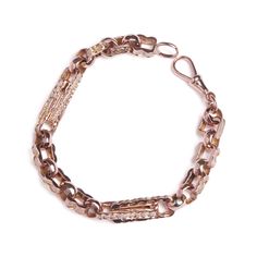 Interesting links and beautiful antique rose gold makes this bracelet a standout.  Once a pocket watch chain now a beautiful bracelet.  The interlocking textured ruffle edge link is interspersed with figure 8 links to create interest and texture.    Antique 9 KT Rose Gold. 13.9 Grams.  English in origin.   7.5 inches in length with a dog clip closure.  This bracelet is great on its own or stacked with other link and bangle bracelets. Crescent Necklace, Dog Clip, Pocket Watch Chain, Gold Engraving, Watch Chain, Rose Gold Bracelet, Antique Roses, Heart Locket, Pearl Pendant