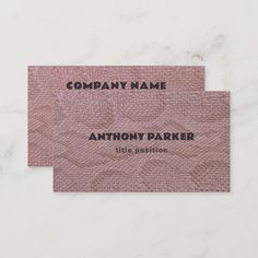 a business card with the name anthony parker in black ink on a white marble background