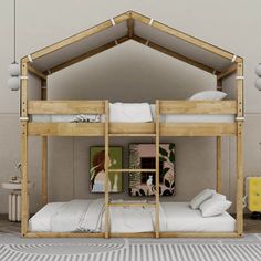 the bunk bed is made out of wood and has two sets of mattresses on each side