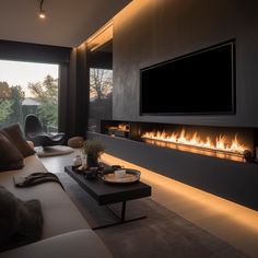 modern living room with fireplace and large windows