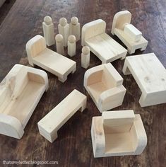 a group of wooden furniture sitting on top of a hard wood floor next to each other