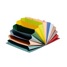 a stack of different colored folders sitting next to each other on a white surface