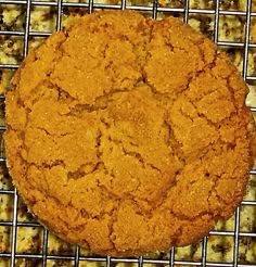 a cookie sitting on top of a cooling rack