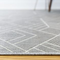 a close up view of a rug on the floor