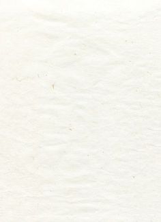 an old white paper textured with brown spots and lines on the edges, as well as some type of writing